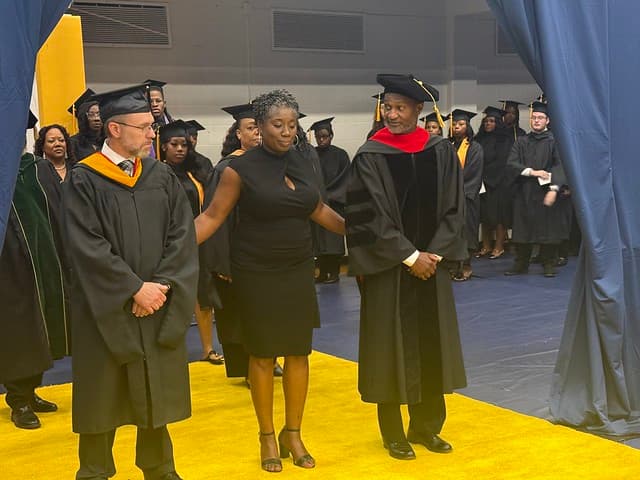 A Lawson State advisor with a student