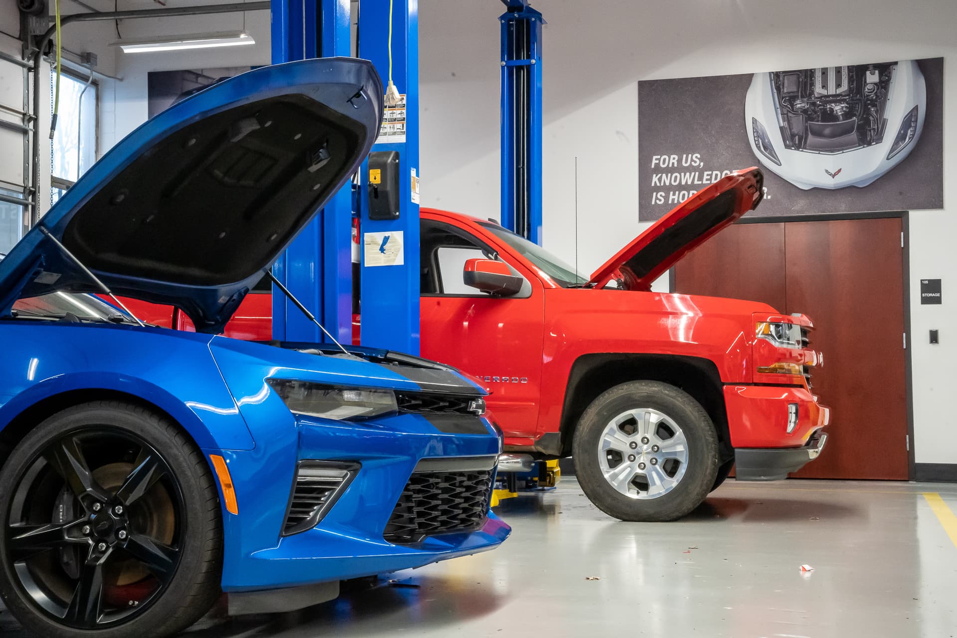 GM ASEP lab with vehicles on lifts