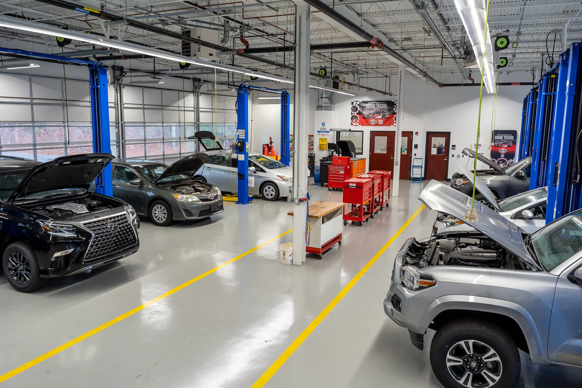 Toyota T-TEN lab with vehicles on lifts